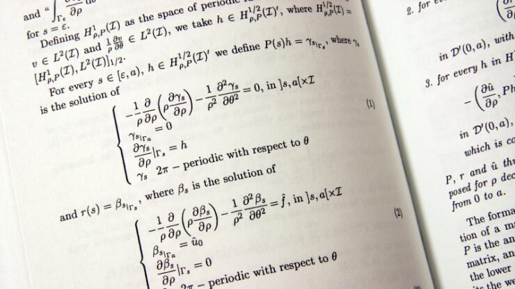 Open physics textbook with equations that reflect how experts use multiple representations