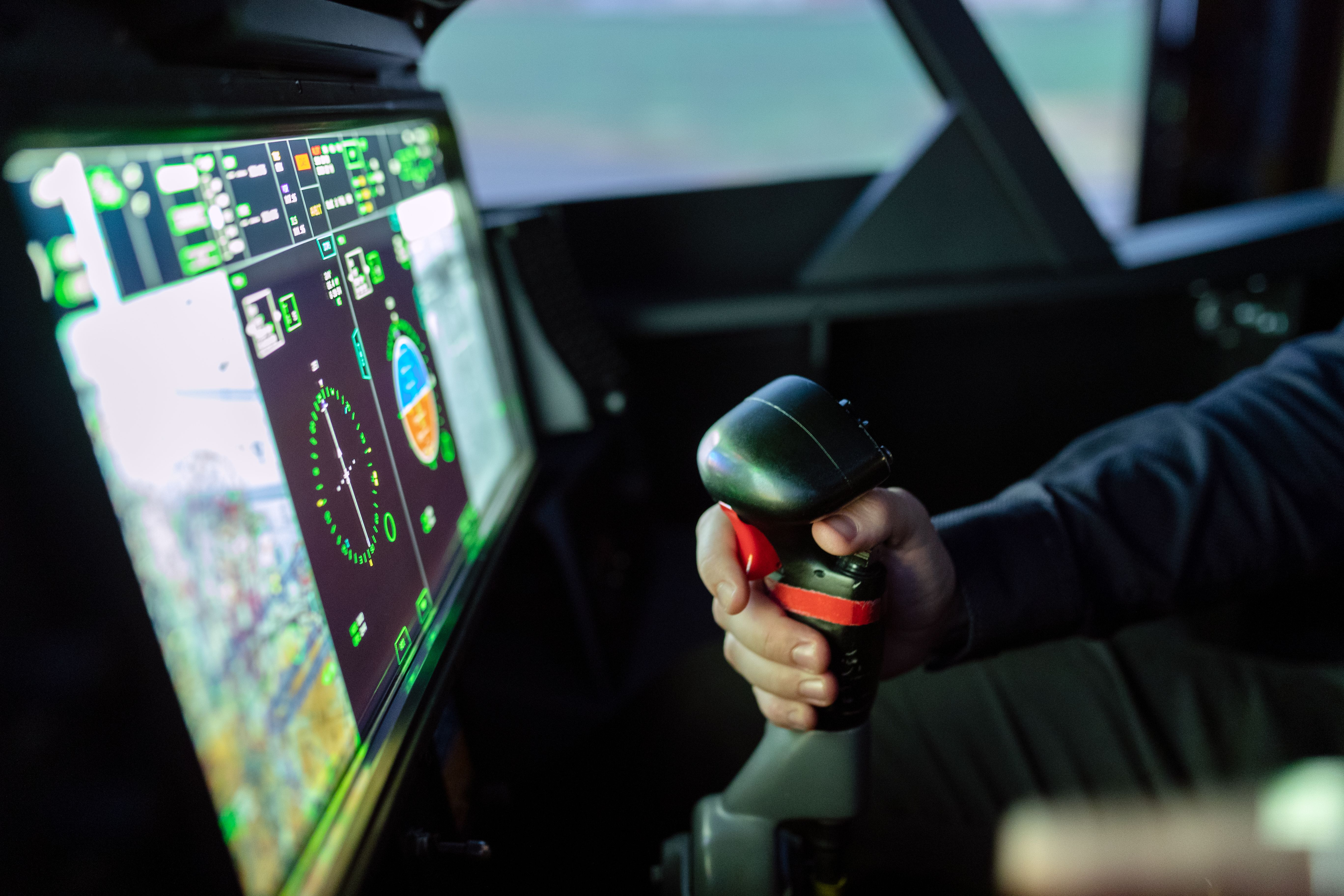 Flight simulator cockpit controls and display, a visual reference for the aviation theme behind the Aviator game.